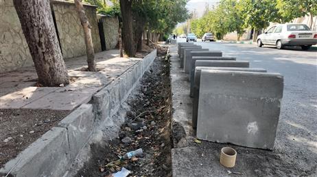 اقدام شهرداری لواسان جهت بازسازی و اصلاح جداول خیابان خداوردی در پی تغییر تراز آسفالت